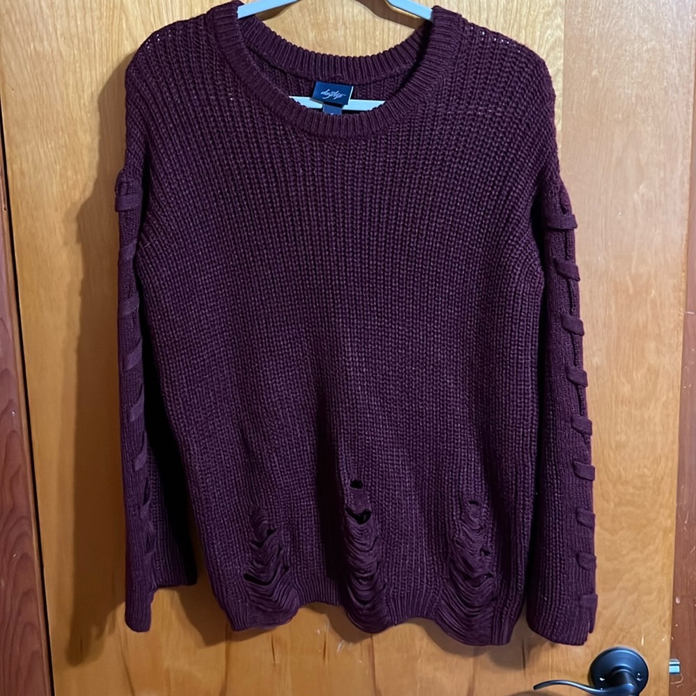 Distressed maroon sweater with braided sleeve detail
